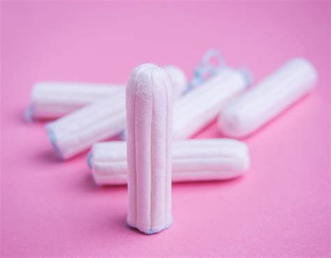 how much string should be left out of a tampon|Tampons